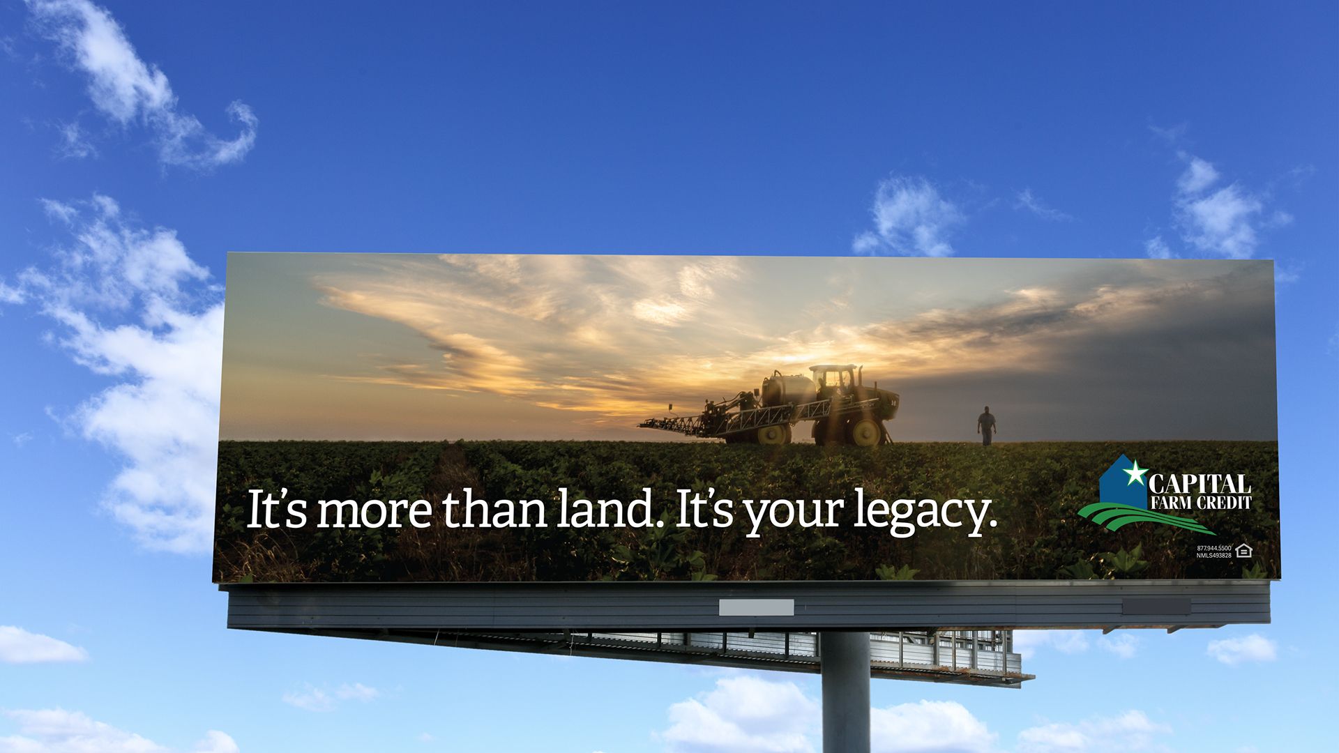 Capital Farm Credit billboard with yellow farm sprayer in a field at golden hour, text reads It's more than land. It's your legacy.